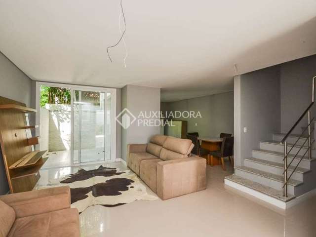 Casa em condomínio fechado com 3 quartos para alugar na Avenida Coronel Marcos, 1460, Pedra Redonda, Porto Alegre, 170 m2 por R$ 6.500