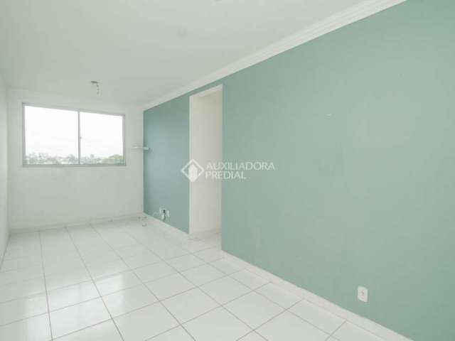 Apartamento com 3 quartos para alugar na Rua Tenente Ary Tarrago, 2080, Jardim Itu Sabará, Porto Alegre, 63 m2 por R$ 1.350