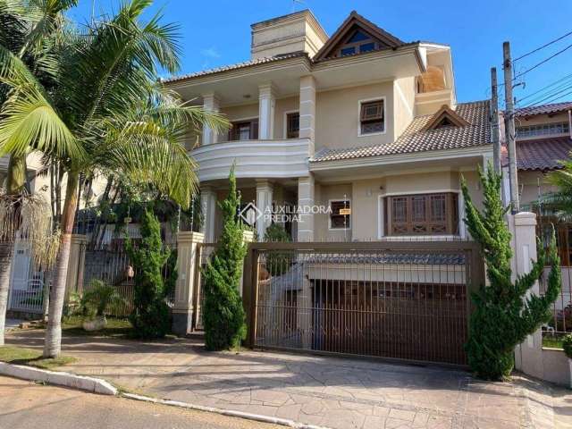 Casa com 4 quartos à venda na Rua das Bromélias, 240, Estância Velha, Canoas, 525 m2 por R$ 2.800.000