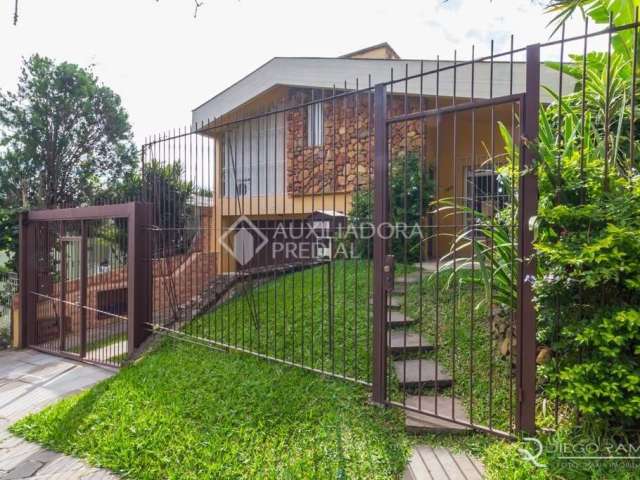Casa em condomínio fechado com 3 quartos à venda na Rua Cláudio Manoel da Costa, 140, Jardim Itu Sabará, Porto Alegre, 262 m2 por R$ 899.000