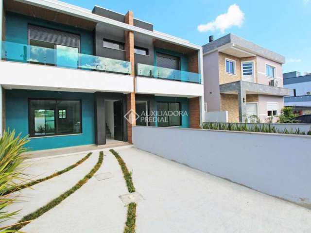 Casa em condomínio fechado com 3 quartos à venda na Rua Ana Abruzzi, 61, Mário Quintana, Porto Alegre, 124 m2 por R$ 595.000
