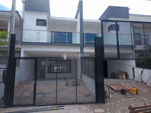 Casa em condomínio fechado com 3 quartos à venda na Rua Lagoa do Peixe, 93, Sarandi, Porto Alegre, 170 m2 por R$ 980.000