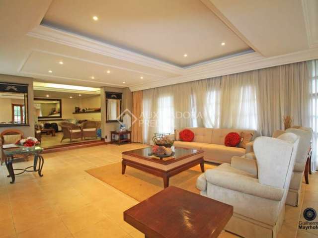 Casa em condomínio fechado com 4 quartos à venda na Avenida da Cavalhada, 5205, Cavalhada, Porto Alegre, 504 m2 por R$ 2.500.000