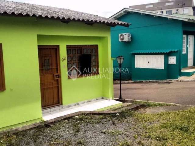 Casa em condomínio fechado com 2 quartos à venda na Rua Vinte e Cinco de Julho, 541, Barnabé, Gravataí, 48 m2 por R$ 225.000