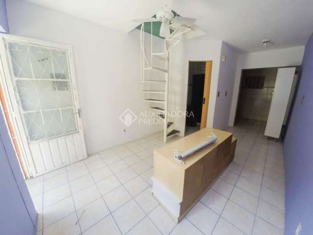 Casa em condomínio fechado com 2 quartos à venda na Rua Joaquim Cruz, 555, Santo Antônio, Porto Alegre, 61 m2 por R$ 135.000