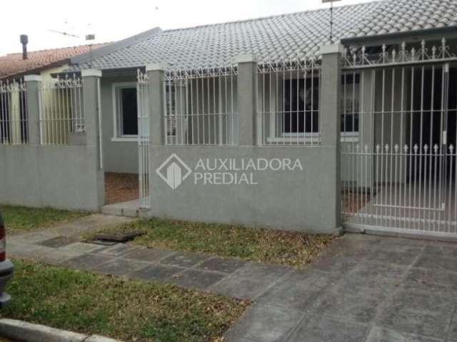 Casa em condomínio fechado com 3 quartos à venda na Rua das Araucárias, 1090, Harmonia, Canoas, 115 m2 por R$ 700.000