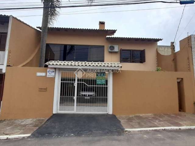 Casa com 3 quartos à venda na Rua Jequié, 130, Santa Isabel, Viamão, 209 m2 por R$ 800.000