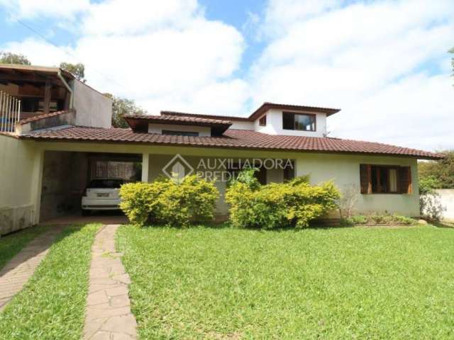 Casa com 4 quartos à venda na Rua Margareth, 168, Viamópolis, Viamão, 255 m2 por R$ 750.000