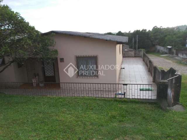 Casa em condomínio fechado com 2 quartos à venda na Rua Doze de Outubro, 546, Santo Onofre, Viamão, 200 m2 por R$ 340.000