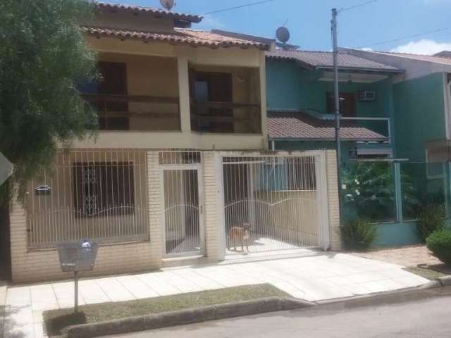 Casa em condomínio fechado com 3 quartos à venda na CANARIOS, 597, Porto Verde, Alvorada, 145 m2 por R$ 450.000