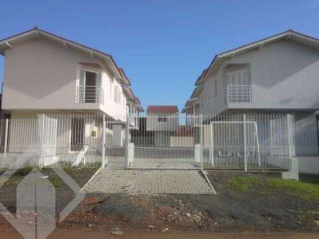 Casa em condomínio fechado com 3 quartos à venda na Rua Luiz de Camões, 48, Tijuca, Alvorada, 78 m2 por R$ 246.000