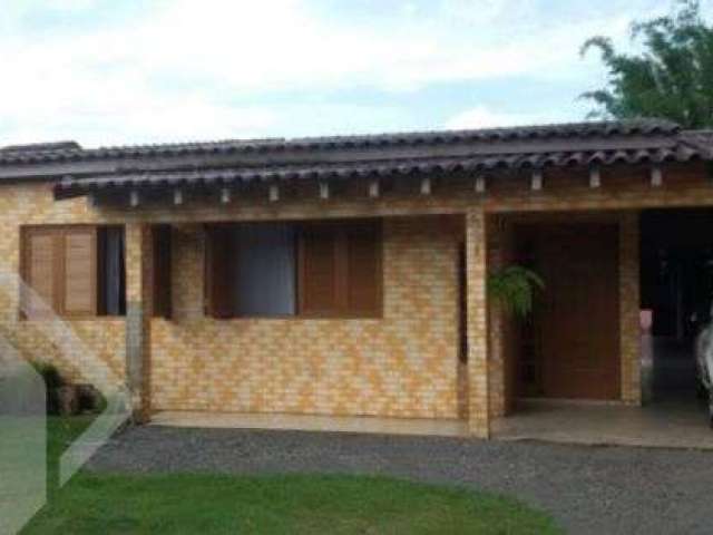 Casa em condomínio fechado com 3 quartos à venda na Rua Oceania, 581, Passo do Feijó, Alvorada, 160 m2 por R$ 393.000