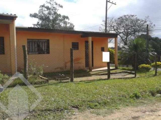 Casa em condomínio fechado com 3 quartos à venda na Rua Portela, 2437, Florescente, Viamão, 150 m2 por R$ 210.000