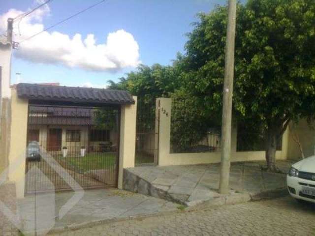 Casa em condomínio fechado com 4 quartos à venda na Rua Tobias Barreto, 126, Maringá, Alvorada, 120 m2 por R$ 445.000