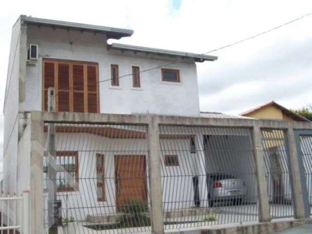 Casa em condomínio fechado com 3 quartos à venda na Rua Alcides Veiga Barcellos, 166, Aparecida, Alvorada, 188 m2 por R$ 636.000