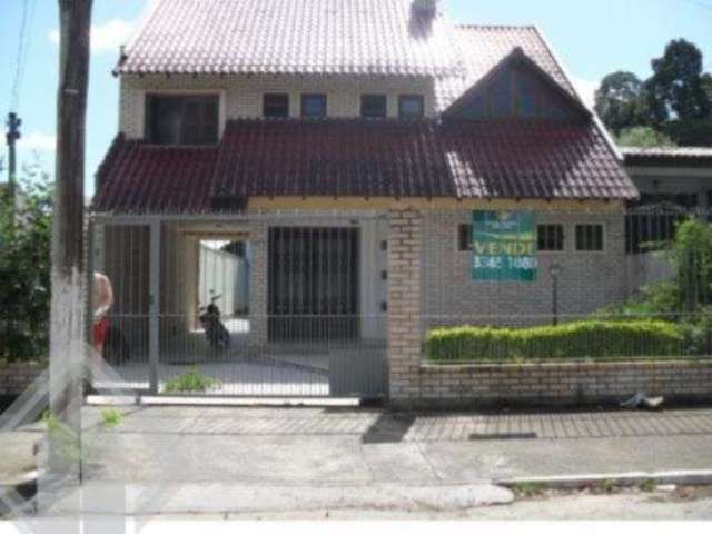 Casa em condomínio fechado com 4 quartos à venda na Rua Sete Irmãos, 366, Santa Cecília, Viamão, 320 m2 por R$ 585.000