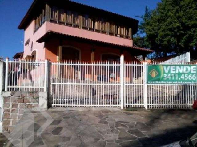 Casa em condomínio fechado com 3 quartos à venda na Rua João de Deus Oliveira, 621, Bela Vista, Alvorada, 673 m2 por R$ 530.000