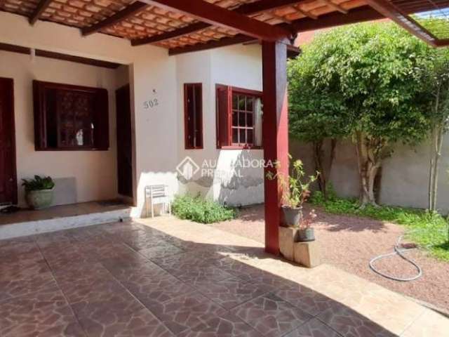 Casa com 4 quartos à venda na Rua Condores, 502, Jardim Algarve, Alvorada, 94 m2 por R$ 300.000