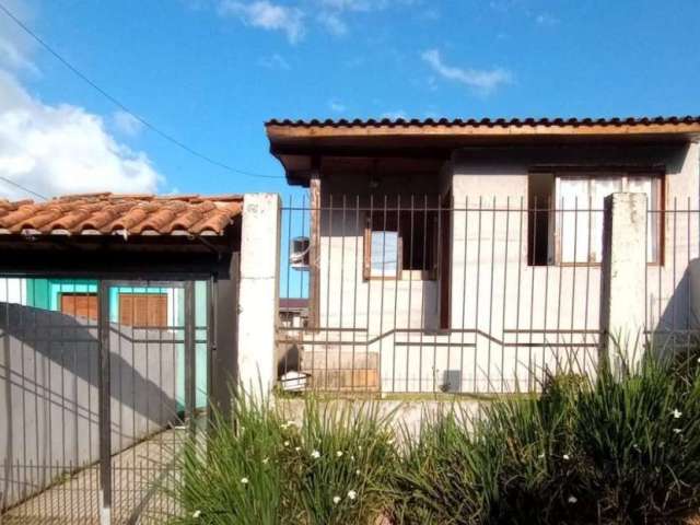Casa com 2 quartos à venda na Rua Almiro Barcelos, 61, Stella Maris, Alvorada, 50 m2 por R$ 259.000