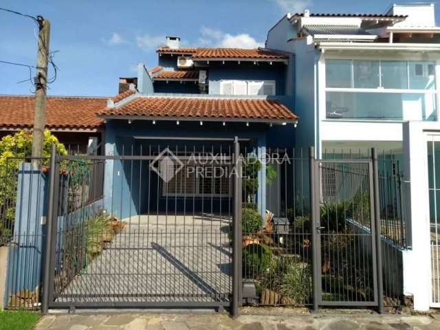 Casa em condomínio fechado com 3 quartos à venda na Rua Professor Elpídio Ferreira Paes, 57, Aberta dos Morros, Porto Alegre, 205 m2 por R$ 690.000