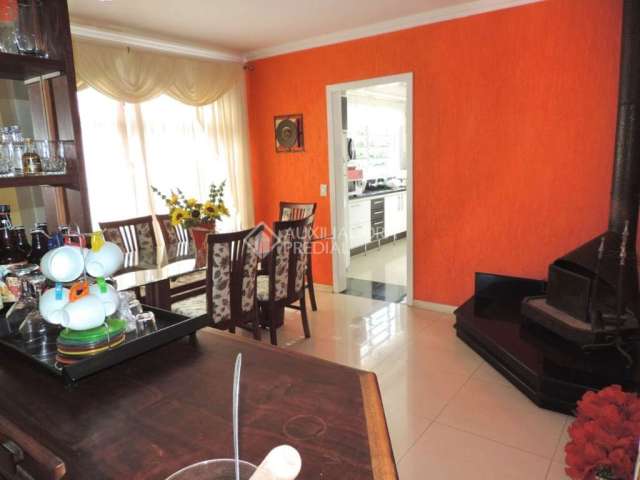 Casa em condomínio fechado com 3 quartos à venda na Rua Líbia, 141, Vila Ipiranga, Porto Alegre, 259 m2 por R$ 1.100.000