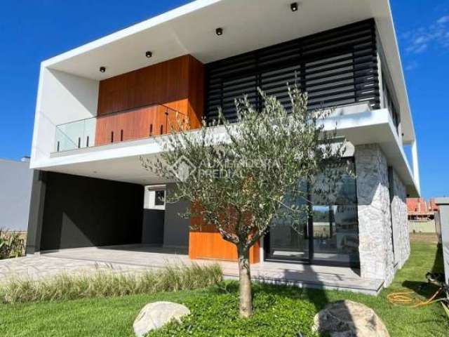 Casa em condomínio fechado com 4 quartos à venda na Ipanema, 0800, Curumim, Capão da Canoa, 300 m2 por R$ 2.600.000