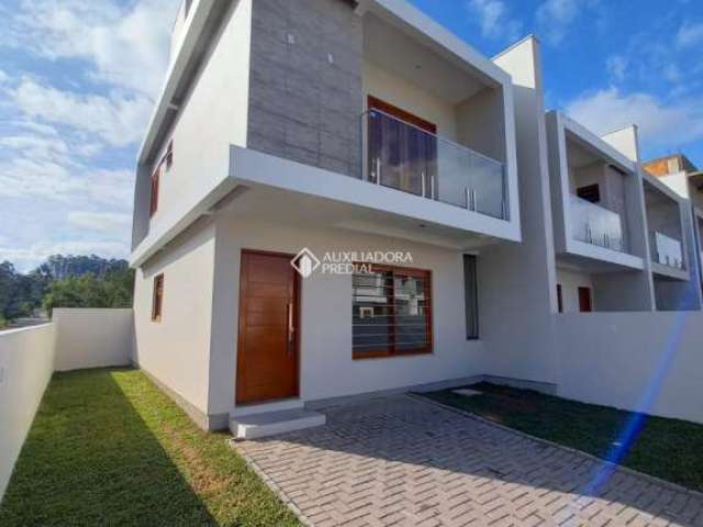 Casa com 3 quartos à venda na Rua Querência, 240, Centenário, Sapiranga, 105 m2 por R$ 460.000