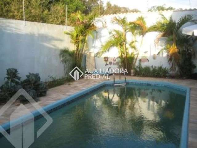 Casa com 3 quartos à venda na CARLOS DE MOURA E CUNHA, DOUTOR, 12, Centro, Guaíba, 167 m2 por R$ 950.000