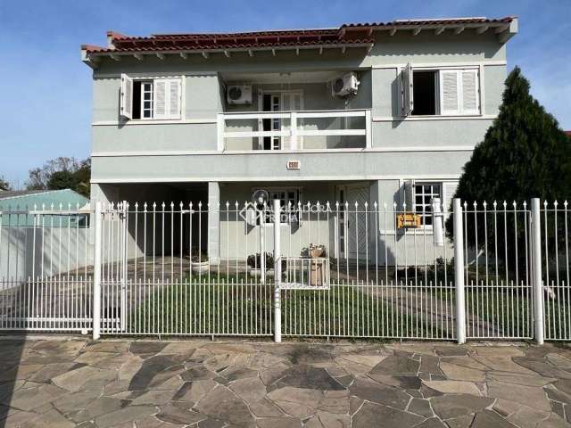 Casa com 4 quartos à venda na Avenida Vereador Breno Guimarães, 408, Ermo, Guaíba, 180 m2 por R$ 790.000
