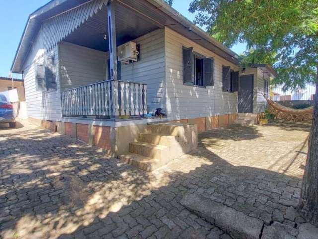 Casa com 4 quartos à venda na JOSE VALDIR GARCIA, 34, Columbia City, Guaíba, 130 m2 por R$ 400.000