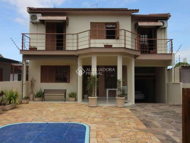 Casa com 4 quartos à venda na Rua Arcelino José da Silveira, 72, Ermo, Guaíba, 264 m2 por R$ 720.000