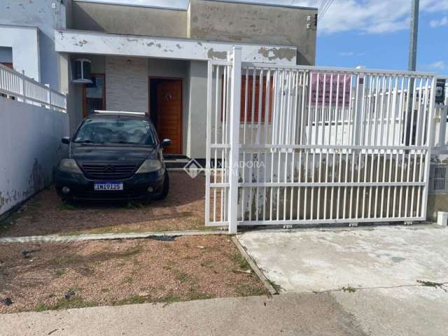 Casa com 2 quartos à venda na Rua João Sebastião Gomes, 1353, Flórida, Guaíba, 52 m2 por R$ 245.000