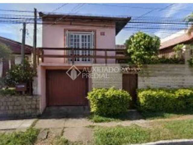 Casa em condomínio fechado com 6 quartos à venda na Avenida Dona Frutuosa, 324, Coronel Nassuca, Guaíba, 311 m2 por R$ 980.000