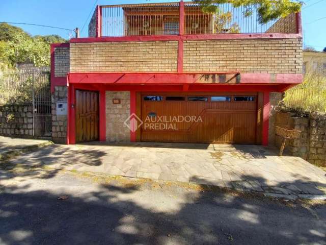Casa em condomínio fechado com 3 quartos à venda na Rua Aladim de Araújo Pinto, 353, Centro, Guaíba, 308 m2 por R$ 1.590.000