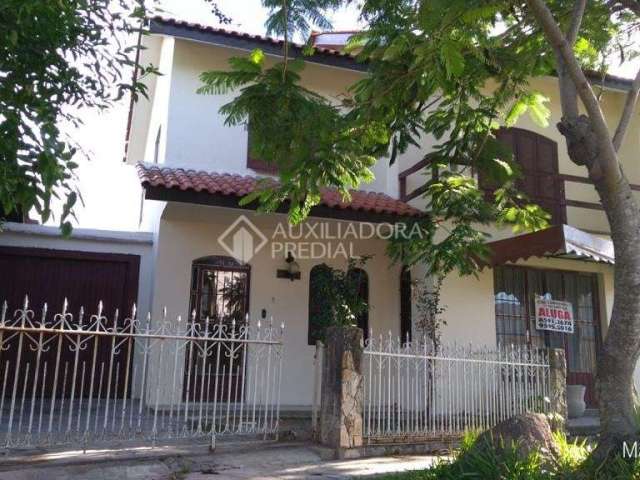 Casa em condomínio fechado com 4 quartos à venda na Rua Sergipe, 242, Parque 35, Guaíba, 300 m2 por R$ 659.000