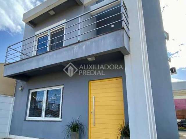 Casa com 3 quartos à venda na Rua Celina Rosa da Silva, 111, Jardim dos Lagos, Guaíba, 166 m2 por R$ 750.000