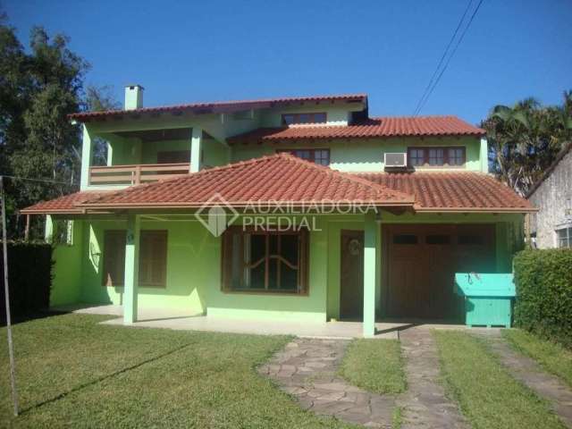 Casa com 4 quartos à venda na EVARISTO LOPES DOS SANTOS, CORONEL, 12, Centro, Guaíba, 194 m2 por R$ 860.000