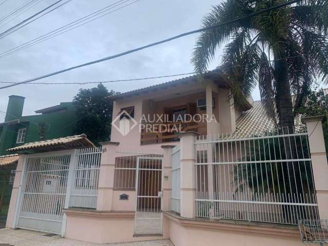 Casa com 3 quartos à venda na Rua Mato Grosso, 98, Parque 35, Guaíba, 217 m2 por R$ 1.010.000