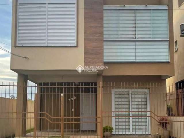 Casa com 3 quartos à venda na Rua O Tempo e o Vento, 736, Jardim dos Lagos, Guaíba, 87 m2 por R$ 420.000