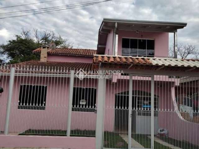 Casa com 5 quartos à venda na Rua Borges de Medeiros, 61, Jardim Planalto, Esteio, 192 m2 por R$ 490.000