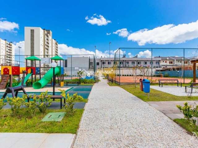 Terreno em condomínio fechado à venda na Rua dos Pinheiros, 71, Igara, Canoas, 250 m2 por R$ 590.000