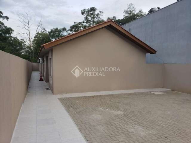 Casa em condomínio fechado com 2 quartos à venda na Avenida Doutor Sezefredo Azambuja Vieira, 5995, Olaria, Canoas, 36 m2 por R$ 179.000