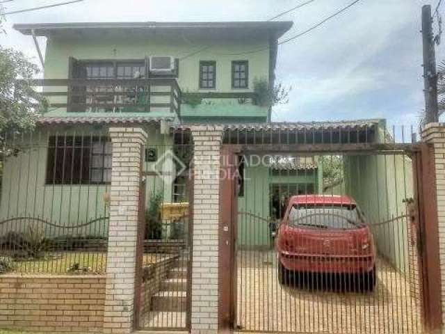 Casa com 4 quartos à venda na Rua Américo Vespucio, 71, Nossa Senhora das Graças, Canoas, 360 m2 por R$ 585.000