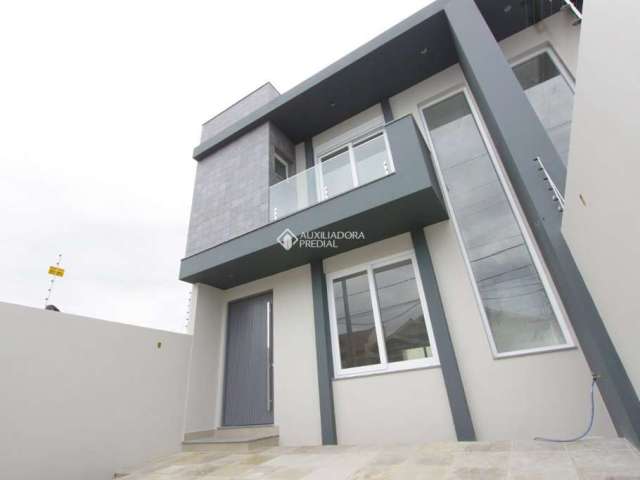 Casa com 3 quartos à venda na Rua Canaã, 23, Estância Velha, Canoas, 129 m2 por R$ 890.000