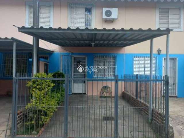 Casa em condomínio fechado com 2 quartos à venda na Avenida João Antônio Silveira, 1045, Restinga, Porto Alegre, 47 m2 por R$ 165.000