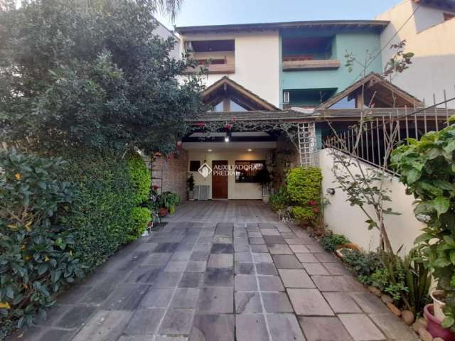 Casa em condomínio fechado com 3 quartos à venda na Rua Claudio da Silva Pinto, 78, Espírito Santo, Porto Alegre, 180 m2 por R$ 599.000