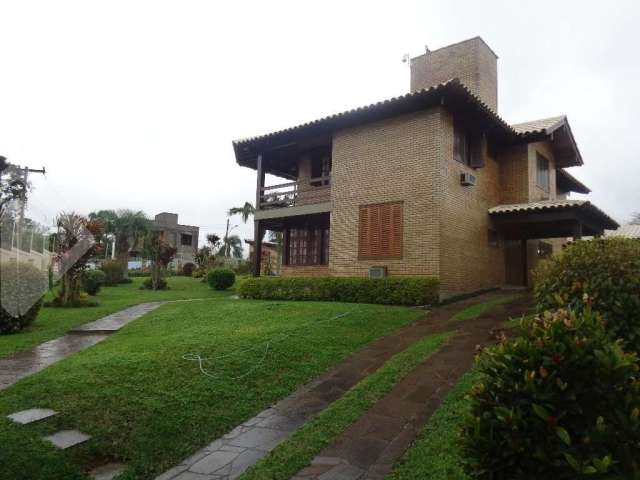 Casa em condomínio fechado com 6 quartos à venda na Rua Marechal José D. dos Reis, 33, Tarumã, Viamão, 408 m2 por R$ 1.500.000