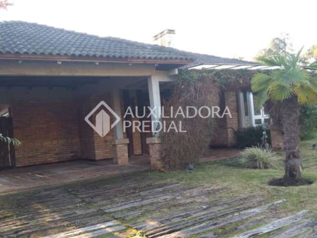 Casa em condomínio fechado com 4 quartos à venda na Avenida Juca Batista, 8000, Chapéu do Sol, Porto Alegre, 294 m2 por R$ 1.780.000