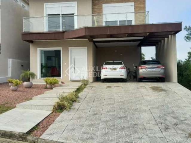 Casa em condomínio fechado com 3 quartos à venda na Avenida Senador Salgado Filho, 8500, Jardim Krahe, Viamão, 200 m2 por R$ 1.800.000