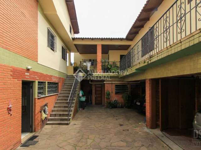Casa com 7 quartos à venda na Rua Gomes Jardim, 622, Santana, Porto Alegre, 442 m2 por R$ 1.800.000